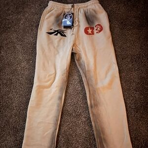 Beige Graphic Sweatpants with Red & Black Logos